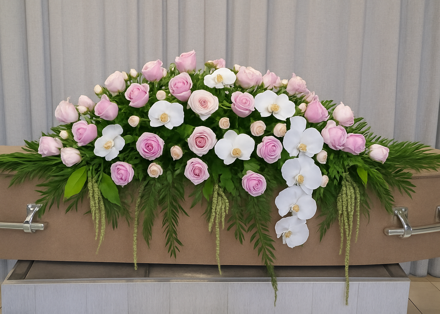 Graceful farewell casket spray