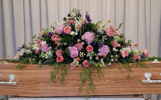 Peaceful garden casket spray